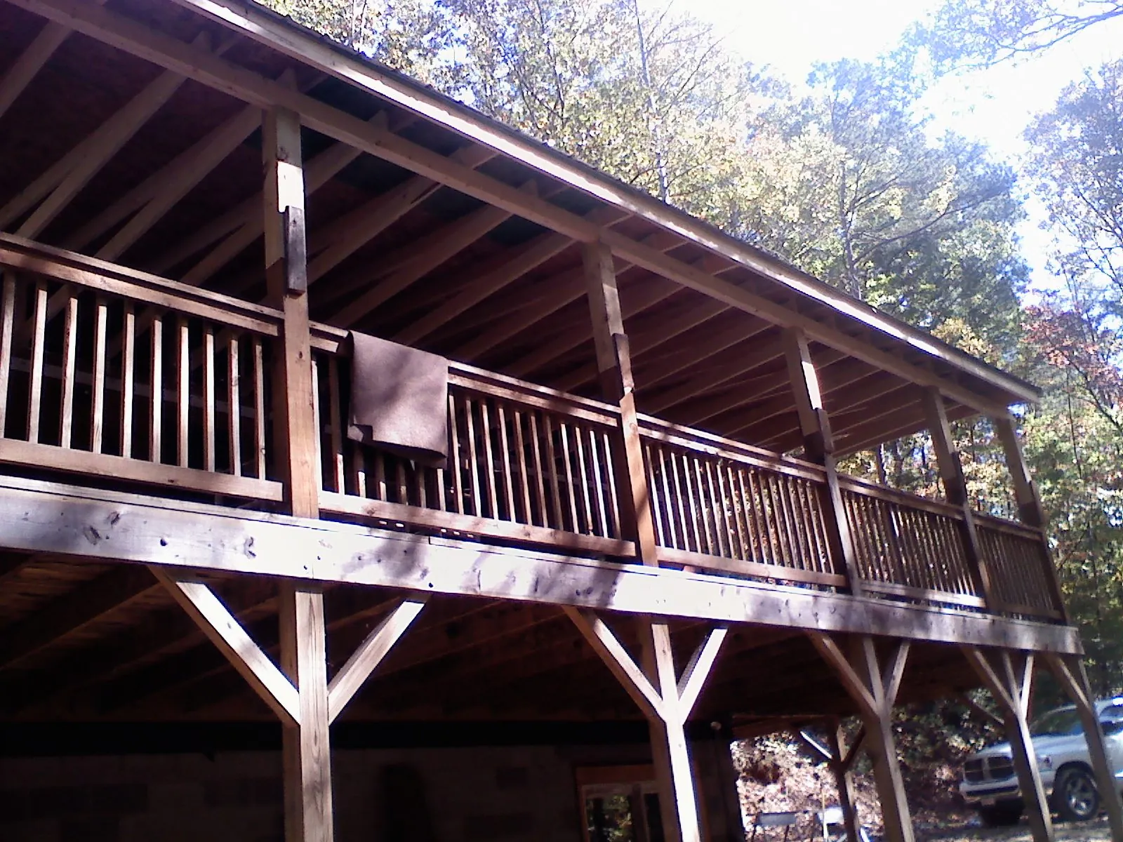 Timber framing under a new elevated porch and deck — Roof Leak Repair in Mountain City by Roofing Brothers